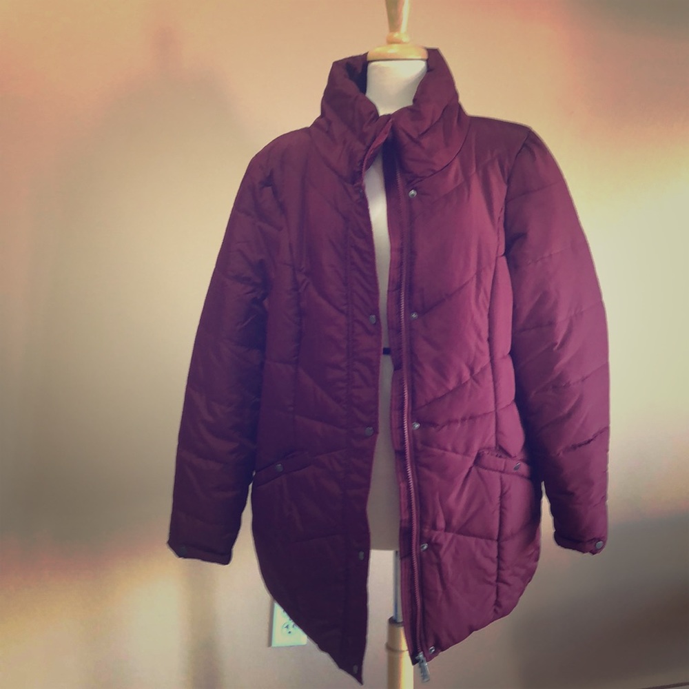 A burgundy ladies puffer jacket from Junarose.